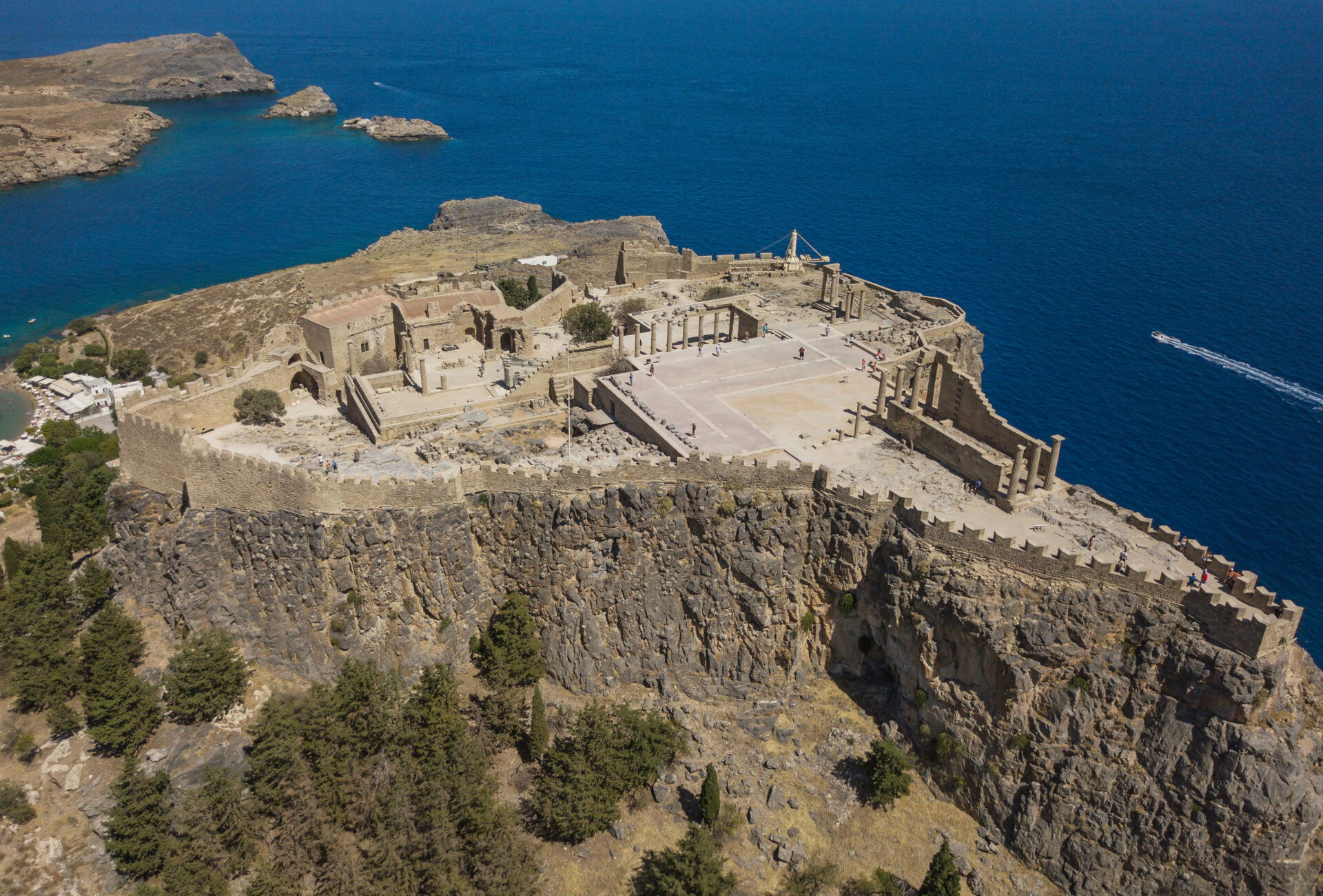 Aerial view of ancient Acropolis of Lindos Lindos Acropolis ancient temple columns Aegean Sea view