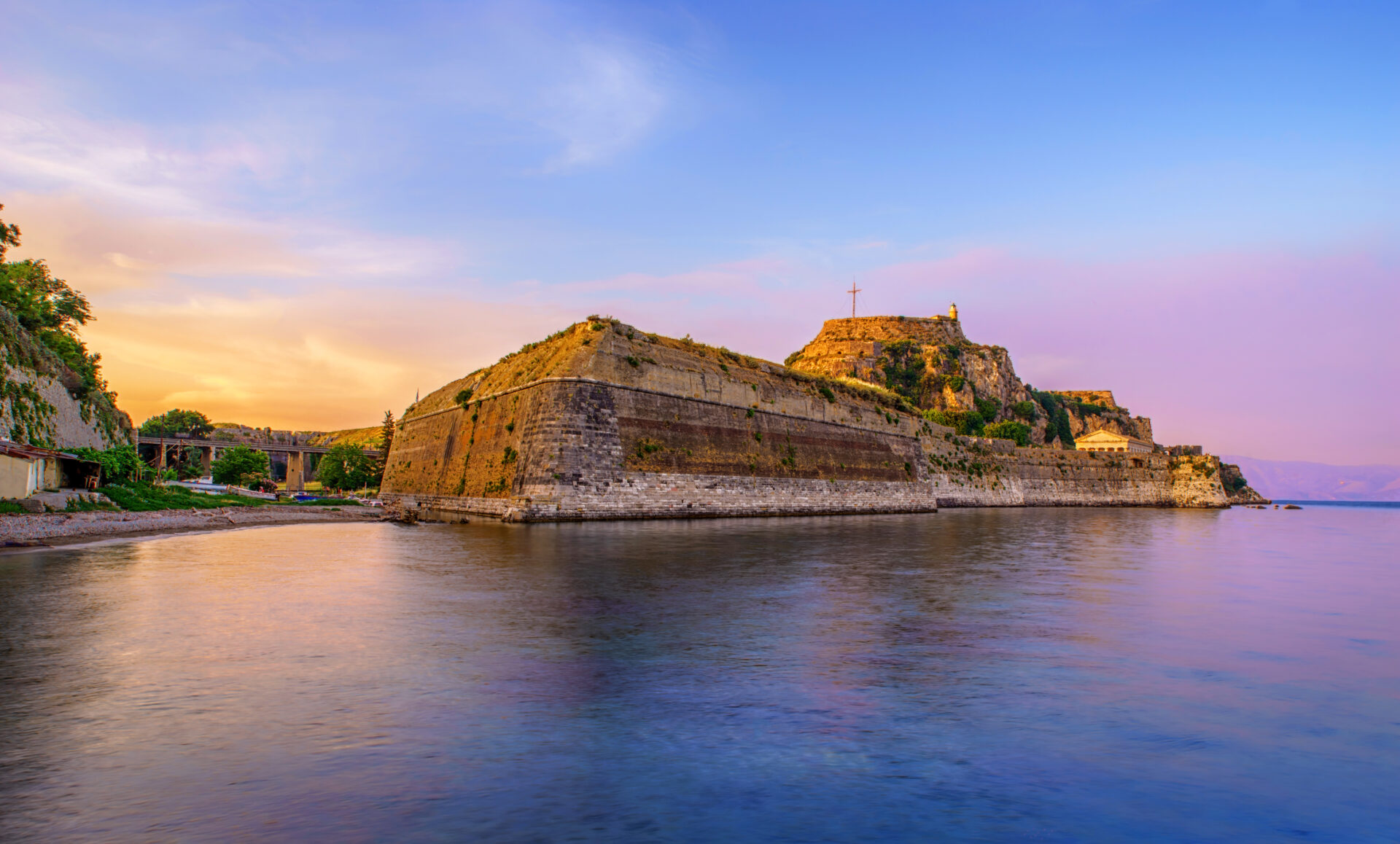 Corfu Old Town, Venetian Fortress Old Fortress of Corfu at sunset, seen from the sea